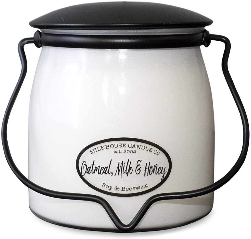 Milkhouse scented soy candle that smells like honey.